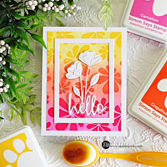 Bright handmade Hello Spring card featuring Retro Daisies stencil blending in yellow, orange, and pink inks with layered white Arctic Poppies die cuts, a dimensional white frame, and a bold hello sentiment accented with Simon Says Stamp inks and blending brushes