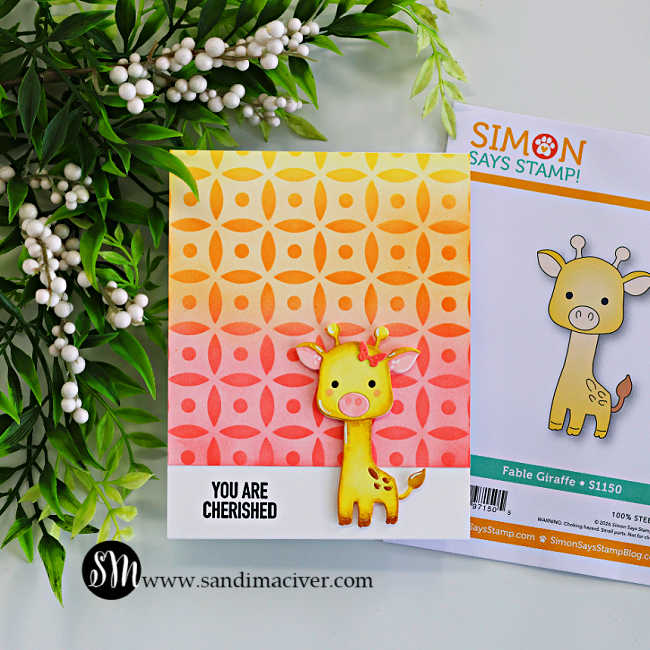 Handmade giraffe card featuring a yellow die-cut giraffe on a bright yellow, orange, and pink ink-blended Dot Petal Pattern stenciled background with a “You Are Cherished” sentiment and coordinating Copic markers beside the card.