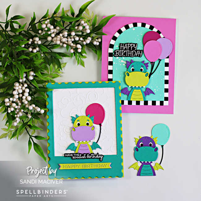 Collection of handmade birthday cards featuring the Spellbinders Party Time Dragon celebrating the company's 23rd birthday. The cards showcase colorful dragons holding balloons, layered die-cut details, embossed backgrounds, a teal polaroid-style frame, and a bold black-and-white striped arch. Bright pink, teal, lime green, and purple cardstock create a fun and whimsical birthday theme.