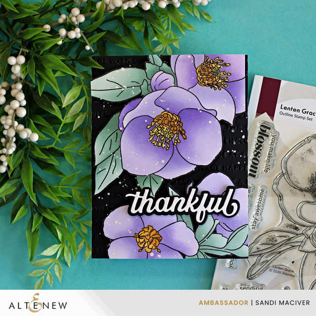 Handmade floral thank you card featuring large lavender flowers and soft mint green leaves from the Altenew Lenten Grace Stamp and Stencil Set. The florals are layered over a black embossed background with a bold white "thankful" sentiment. The card is photographed with Altenew ink pads and blending brushes on a turquoise background with decorative greenery.