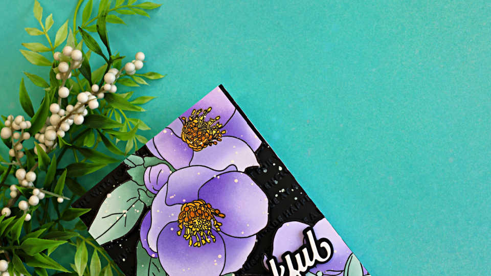 Close-up of a handmade floral thank you card featuring large lavender flowers with golden centers and soft mint green leaves from the Altenew Lenten Grace Stamp and Stencil Set. The florals are layered over a glossy black embossed background with a bold white "thankful" sentiment, photographed on a turquoise backdrop with greenery accents.