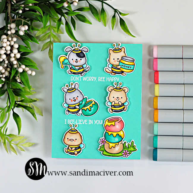 Seafoam teal interactive spinner card featuring Copic-colored critters dressed as bees, stacked honey pots, white embossed sentiments, and coordinating Copic Markers.