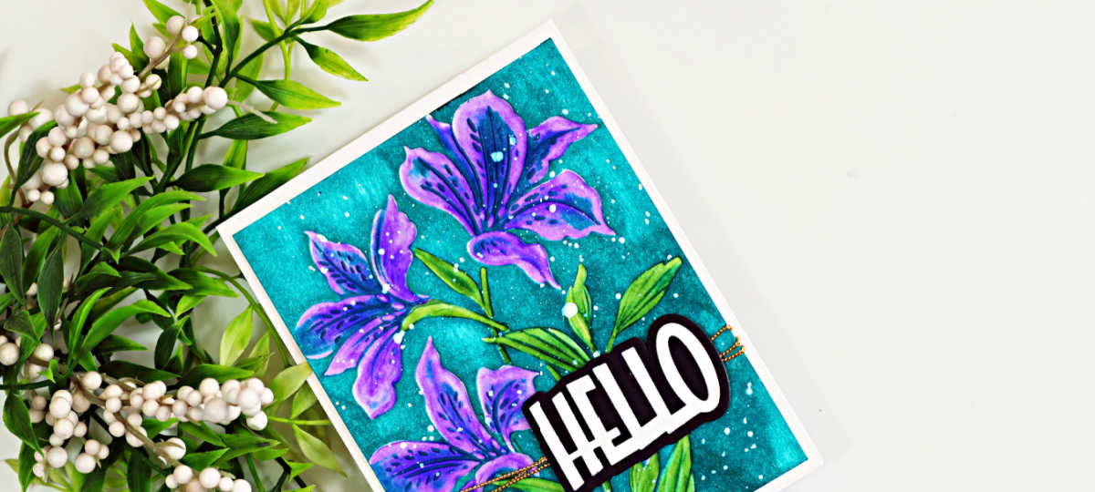 Handmade floral card featuring purple Alstroemeria blooms watercolored with Karin Markers on a vibrant teal background, finished with a bold HELLO sentiment.