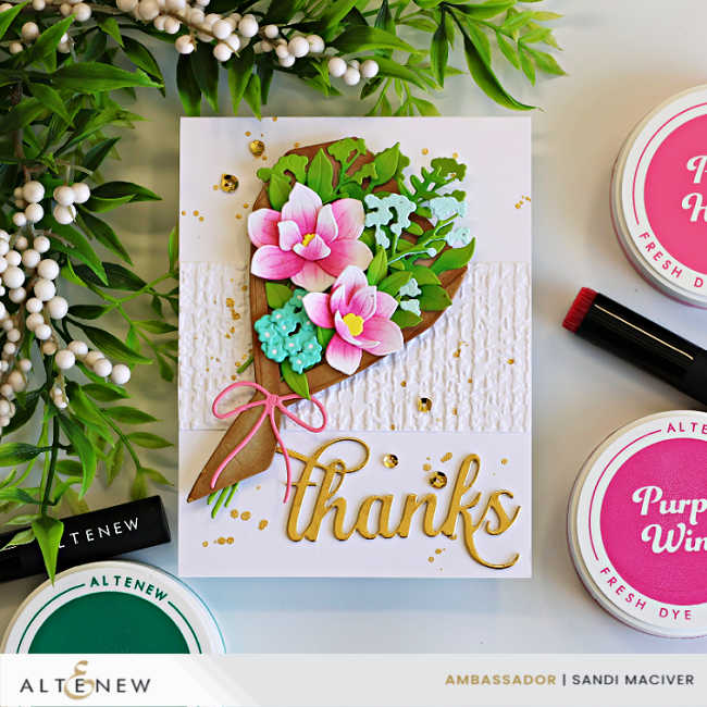 Elegant Parchment Bouquet Thank You Card featuring the Altenew Parchment Bouquet Die Set with layered pink flowers, green foliage, a textured embossed white background, gold splatter, and a gold "thanks" sentiment, surrounded by coordinating Altenew inks and markers.