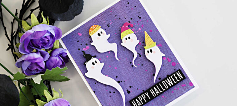 Simon Says Stamp STAMPtember Swirling Ghosts Halloween card featuring four white ghosts in colorful hats on a purple Distress Oxide background with pink and black splatters.