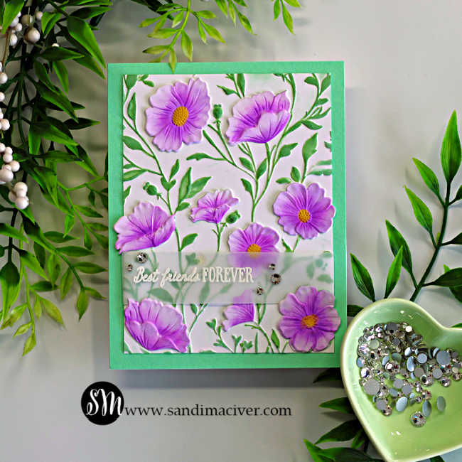 Soft and pretty Morning Glory card featuring dimensional purple flowers, green foliage, a mint green card base, and a white heat-embossed “Best Friends Forever” sentiment on vellum.