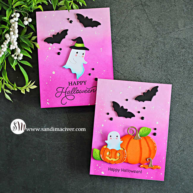 wo pink Halloween cards featuring cute die-cut ghosts, orange pumpkins, black bats, witch hat, and bright pink ink-blended backgrounds with white splatters.