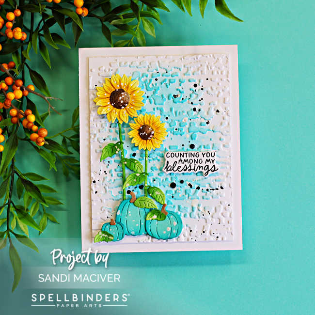 Handmade fall card featuring bright yellow sunflowers and aqua pumpkins on a textured white and turquoise background, finished with a “Counting You Among My Blessings” sentiment.