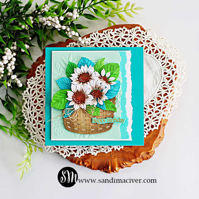 Handmade Simon Says Stamp STAMPtember® card featuring white sunflowers with brown centers, bright green and teal leaves arranged in a dimensional woven basket, with a mint embossed background, torn-edge layers and a Happy Birthday sentiment.