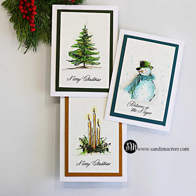 Three messy watercolor Christmas cards featuring a green evergreen tree, a soft blue snowman, and holiday candles with simple layered mats.