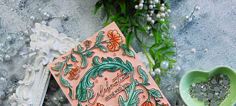 Pinkfresh Studio Grace and Gratitude floral card featuring soft peach flowers, mint green foliage, and a “Celebrating along with you” sentiment.