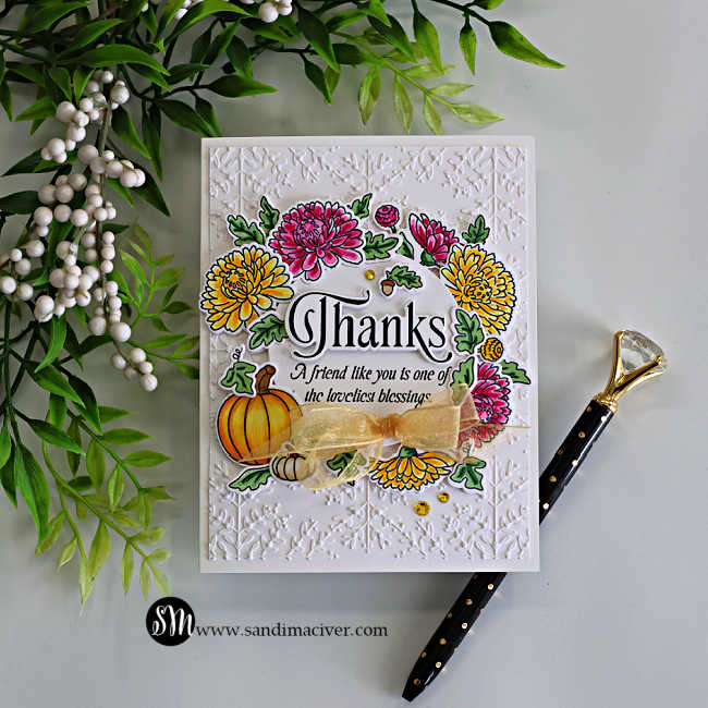 Handmade fall thank-you card featuring colorful mums, pumpkins, greenery, a gold ribbon bow, and a large Thanks sentiment using the Simon Says Stamp Grateful Moments Bundle.