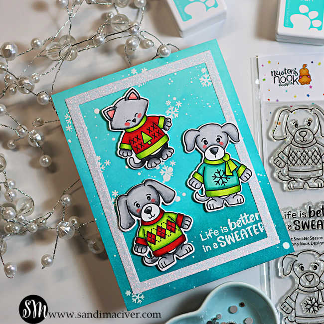 Simon Says Stamp and Newton’s Nook Sweater Season Christmas card featuring a cat and two dogs in colorful holiday sweaters.
