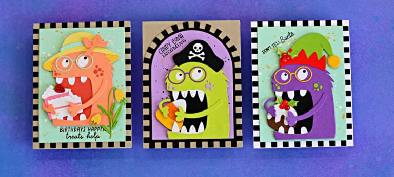 Three handmade cards featuring Chompster new accessories: coral Mrs. Chompster with birthday cake, a lime green Halloween pirate with candy corn, and a purple Christmas elf with pudding, each framed by a checkerboard border.