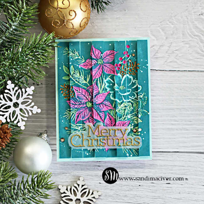 Handmade Christmas card featuring pink poinsettias and teal flowers with the Colored Embossed Double Vision technique, white splatter, and a gold Merry Christmas sentiment.