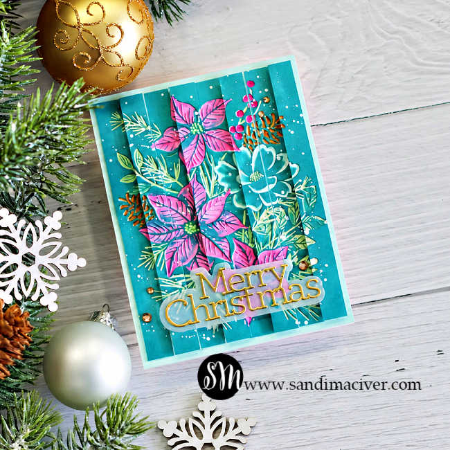 Handmade Christmas card featuring pink poinsettias and teal flowers with the Colored Embossed Double Vision technique, white splatter, and a gold Merry Christmas sentiment.