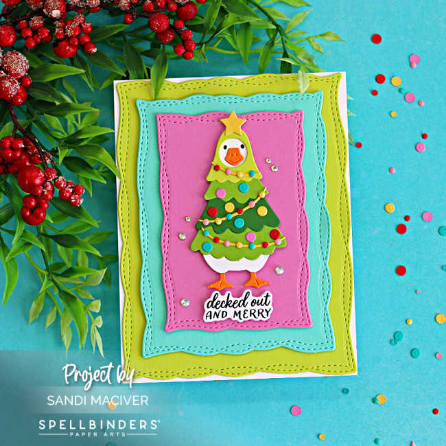 Spellbinders Lit with Joy Christmas card featuring a die-cut goose dressed as a Christmas tree, surrounded by stitched zigzag panels in non-traditional holiday colors.